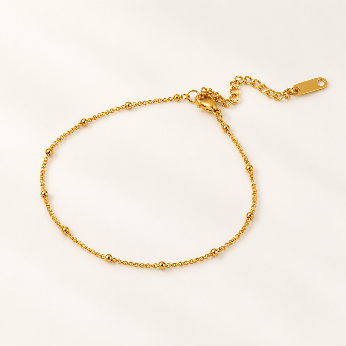 Wren – Stylische goldfarbene Fußkette