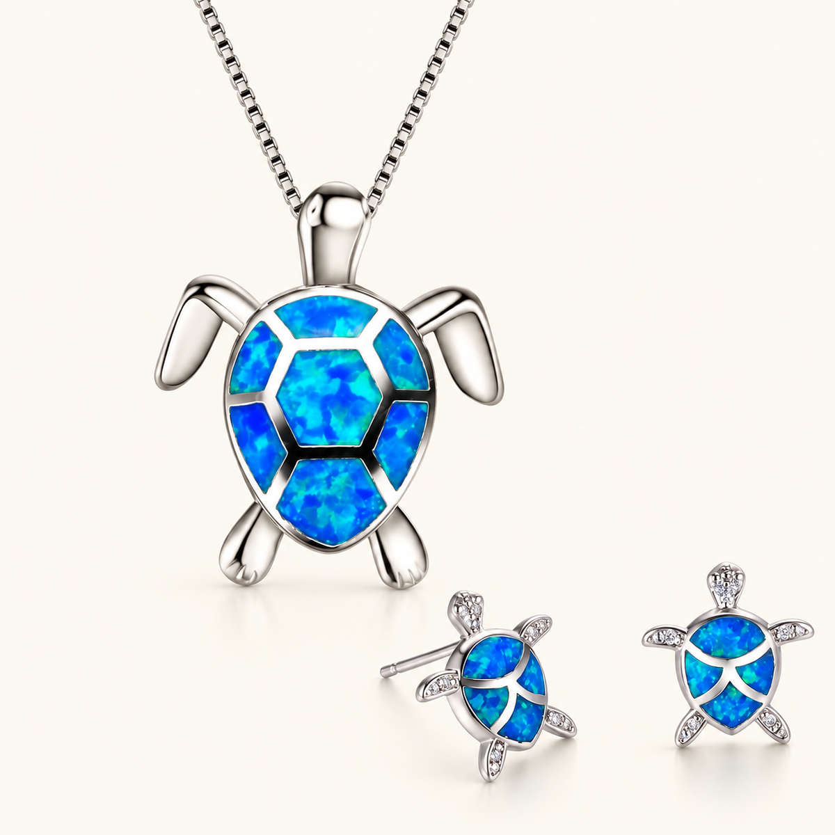 Kailea – Silbergoldenes Schmuckset mit Schildkröte und schimmernden Steindekoren (Halskette + Ohrringe)